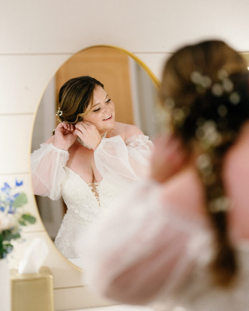 Bride with timeless hair and makeup styled by Mia’s Mark Salon and Retail.